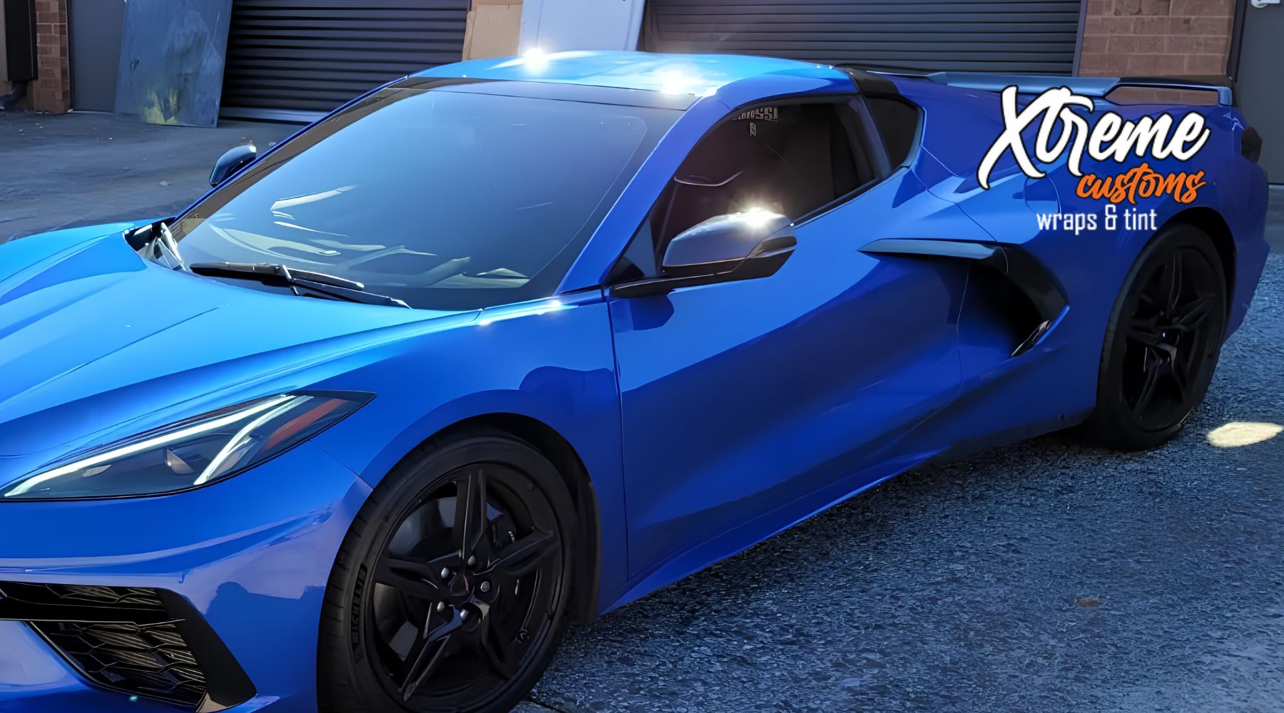 Blue sports car with dark window tint at Xtreme Customs Wraps & Tint in Marietta, GA